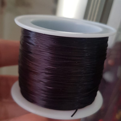 Cuộn Dây Thun CO GIÃN màu Đen xỏ vòng hạt chuỗi Dây này là dây thun chuyên xỏ vòng chuỗi màu Đen, có đủ màu Anh Chị đang đeo chuỗi muốn thay dây khác cho vòng thì đặt cuộn Thun chỉ này nhé