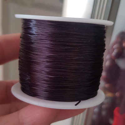 Cuộn Dây Thun CO GIÃN màu Đen xỏ vòng hạt chuỗi Dây này là dây thun chuyên xỏ vòng chuỗi màu Đen, có đủ màu Anh Chị đang đeo chuỗi muốn thay dây khác cho vòng thì đặt cuộn Thun chỉ này nhé