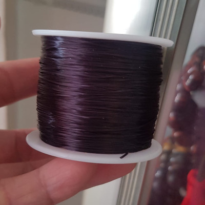 Cuộn Dây Thun CO GIÃN màu Đen xỏ vòng hạt chuỗi Dây này là dây thun chuyên xỏ vòng chuỗi màu Đen, có đủ màu Anh Chị đang đeo chuỗi muốn thay dây khác cho vòng thì đặt cuộn Thun chỉ này nhé