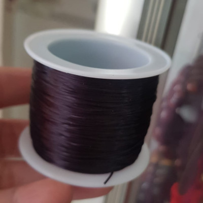 Cuộn Dây Thun CO GIÃN màu Đen xỏ vòng hạt chuỗi Dây này là dây thun chuyên xỏ vòng chuỗi màu Đen, có đủ màu Anh Chị đang đeo chuỗi muốn thay dây khác cho vòng thì đặt cuộn Thun chỉ này nhé