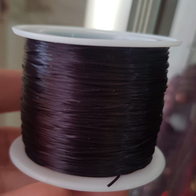 Cuộn Dây Thun CO GIÃN màu Đen xỏ vòng hạt chuỗi Dây này là dây thun chuyên xỏ vòng chuỗi màu Đen, có đủ màu Anh Chị đang đeo chuỗi muốn thay dây khác cho vòng thì đặt cuộn Thun chỉ này nhé