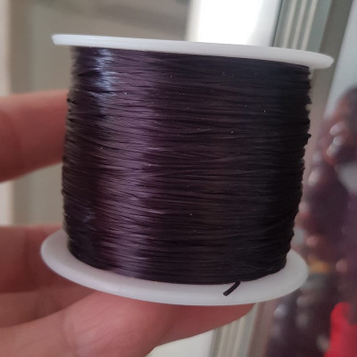 Cuộn Dây Thun CO GIÃN màu Đen xỏ vòng hạt chuỗi Dây này là dây thun chuyên xỏ vòng chuỗi màu Đen, có đủ màu Anh Chị đang đeo chuỗi muốn thay dây khác cho vòng thì đặt cuộn Thun chỉ này nhé