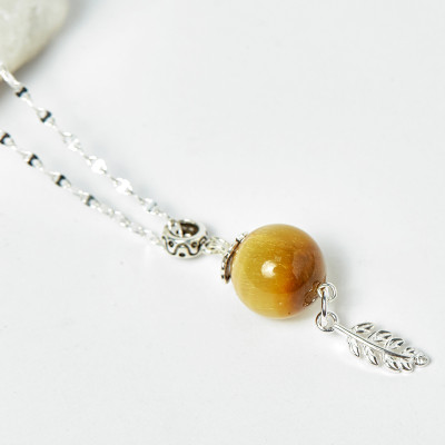 Mặt dây chuyền đá thạch anh mắt hổ vàng tâm 45cm mệnh thổ, kim - Ngọc Quý Gemstones