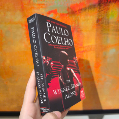 Sách - The Winner Stands Alone by Paulo Coelho - Mass Market Paperback US - Ngoại văn nhập khẩu