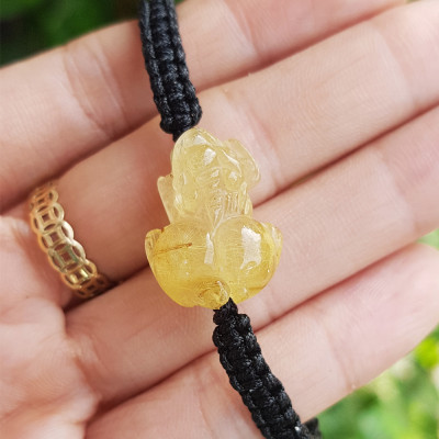 Vòng tay tỳ hưu thạch anh tóc vàng tết dây