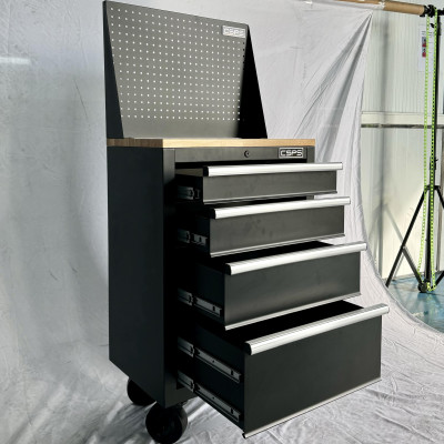 Tủ dụng cụ CSPS 61cm - 04 hộc kéo màu đen bánh xe ván gỗ vách lưới (tay cầm trắng)