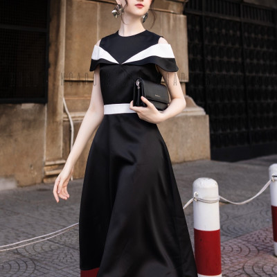 Đầm đen tay con phối trắng NGADO